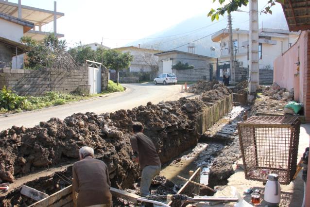 نهضت خدمات شهری _عمرانی شهرداری هچیرود  احداث کانال  هدایت آبهای سطحی محله سنگوارث